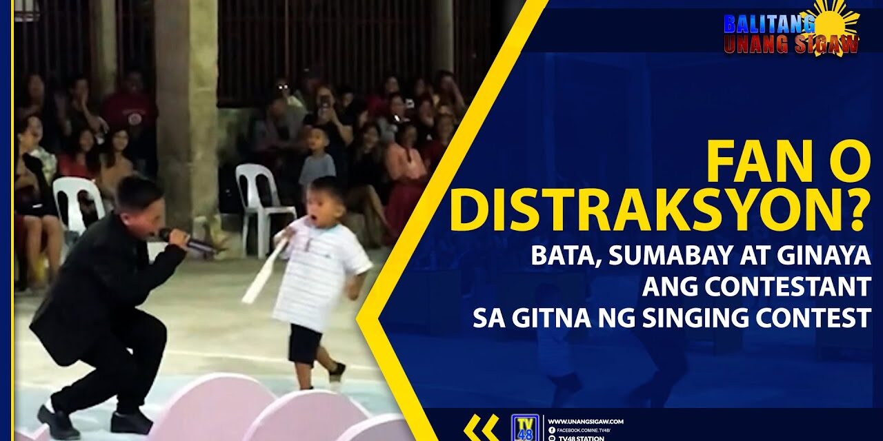 FAN O DISTRAKSYON? BATA, SUMABAY AT GINAYA ANG CONTESTANT SA GITNA NG SINGING CONTEST